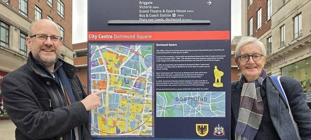 Richard Wilson (left) of Leeds for Europe made a point of highlighting recent Dortmund Square improvements to Geoff Tranter, organiser of the visit from Leeds's German twin city.