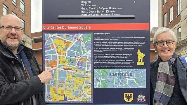 Richard Wilson (left) of Leeds for Europe made a point of highlighting recent Dortmund Square improvements to Geoff Tranter, organiser of the visit from Leeds's German twin city.