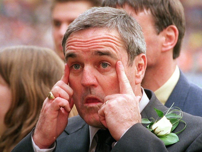 Leeds coach Graham Murray fights back tears during the post-match celebrations.