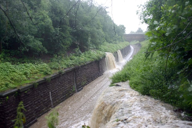 This photo shows serious flooding in the summer of 2008 with Moseley Beck, a continuation of the Oil Mill Beck, bursting its banks and flowing down the railway tracks into the Horsforth end of Bramhope Tunnel. A lot of remedial work has been done on the beck since to stop this happening again.