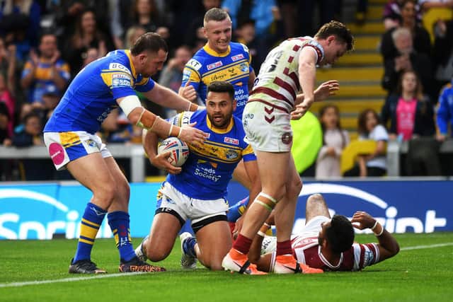 Rhyse Martin has scored 10 tries, including this one against Wigan, in 25 games for Rhinos this season. Picture by Jonathan Gawthorpe.