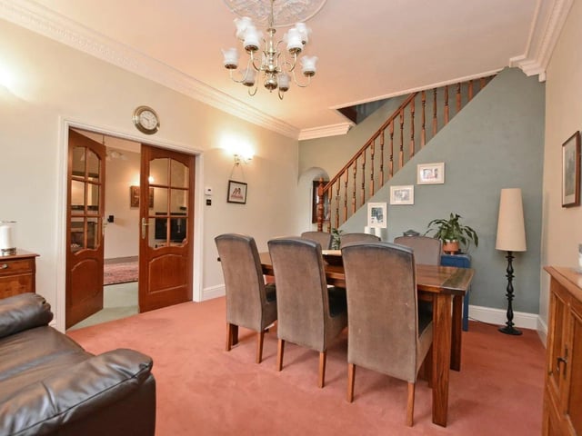 An entrance vestibule leads into the dining hall which is a generous size.