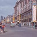 Looking west along The Headrow from the junction with Briggate. Lewis’s department store is on the right. Decorations can be seen to celebrate the coronation of Queen Elizabeth II, which took place on June 2, 1953.