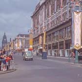 Looking west along The Headrow from the junction with Briggate. Lewis’s department store is on the right. Decorations can be seen to celebrate the coronation of Queen Elizabeth II, which took place on June 2, 1953.