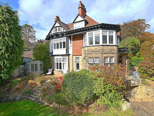 The house stands well within its leafy surroundings.