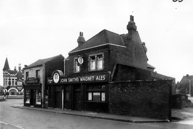 The elaborate frontage of The Volunteer public house can be seen on Holbeck Lane. Pictured in March 1965.