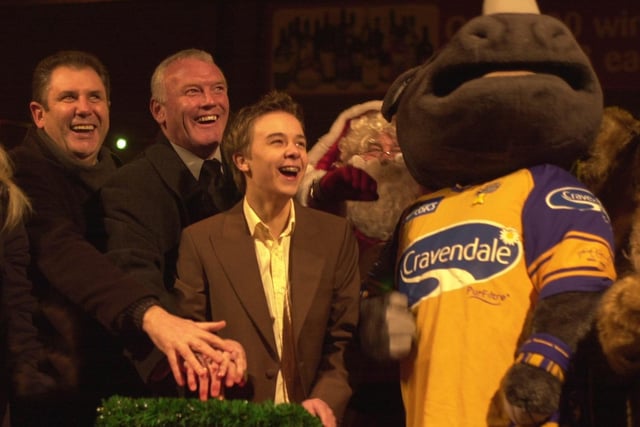 Coronation Street star Jack P Shepherd - who plays David Platt - and Leeds United caretaker manager Eddie Gray switching on the Christmas lights at Rothwell, Leeds. Also in the picture is Ronnie the Rhino and Coun Steve Smith, left, on November 21, 2003.