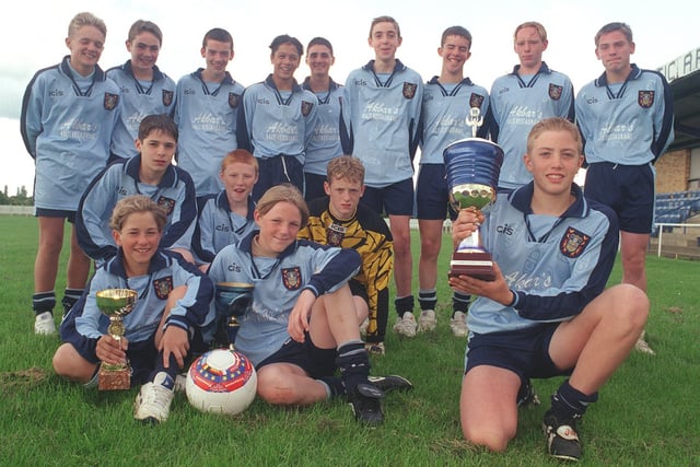 Farsley Celtic U-14s had returned home victorious in June 1999 after winning a competition in France. Pictured holding the winning trophy is captain Kris Milner.