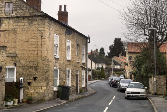 Bramham is known for hosting Leeds Festival every summer, but the usually sleepy village near Wetherby is a popular place to live. It has a happiness score of 7.35 and an average house price of £340,054.