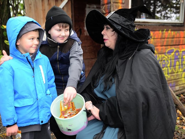 Halloween at Swithens Farm, pumpkin festival in Rothwell. Alfie, eight and Jaxon, five meet Jules the Witch in the wood on the way to the pumpkins