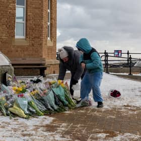 Tributes are laid in memory of Sarah Keeling and Mark Ratcliffe as the search continues for Grace Keeling following the tragedy off the coast of Withernsea