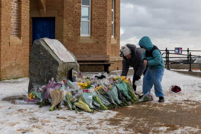 Tributes are laid in memory of Sarah Keeling and Mark Ratcliffe as the search continues for Grace Keeling following the tragedy off the coast of Withernsea