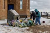 Tributes are laid in memory of Sarah Keeling and Mark Ratcliffe as the search continues for Grace Keeling following the tragedy off the coast of Withernsea