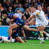 Isaiah Vagana scores Wakefield Trinity's opening try in their loss to Leeds Rhinos. Picture by Alex Whitehead/SWpix.com.