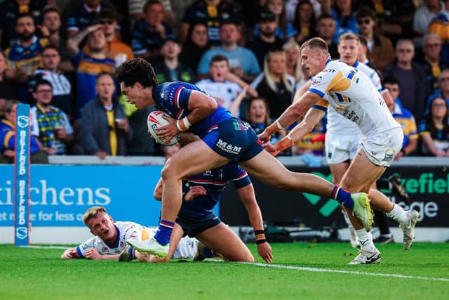 Isaiah Vagana scores Wakefield Trinity's opening try in their loss to Leeds Rhinos. Picture by Alex Whitehead/SWpix.com.
