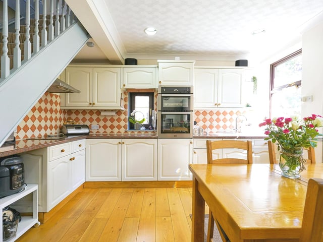 The kitchen and diner is also finished with modern appliances.