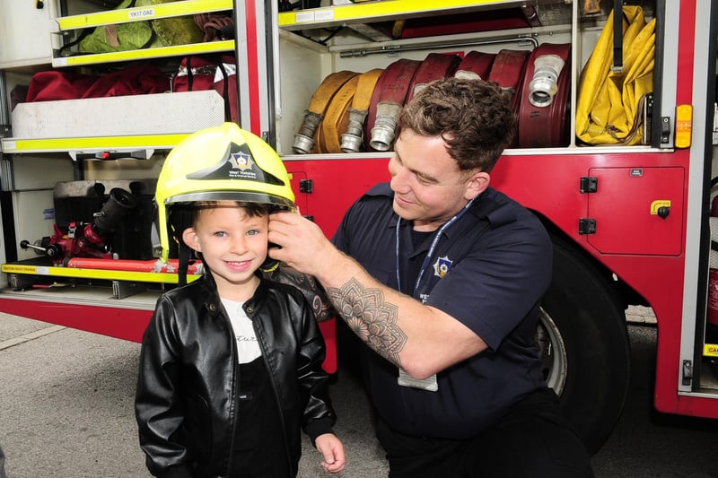 Five-year-old Drew Beaumont, of Moortown, with firefighter Jack Leaning of Moortown Fire Station