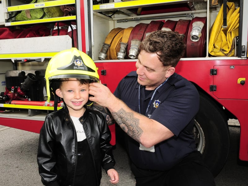 Five-year-old Drew Beaumont, of Moortown, with firefighter Jack Leaning of Moortown Fire Station