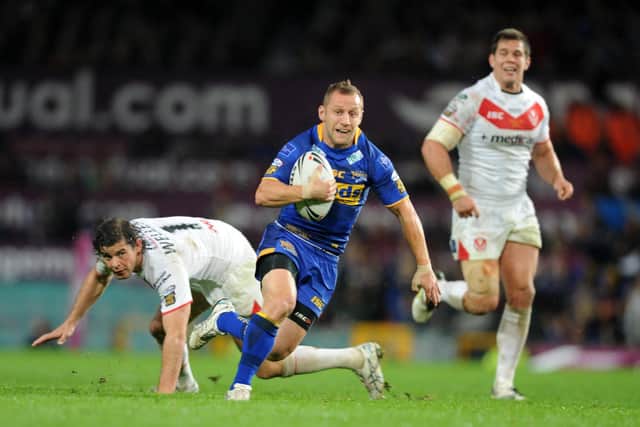 Rob Burrow scores for Rhinos in their 2012 Grand Final win over St Helens. Picture by Steve Riding.