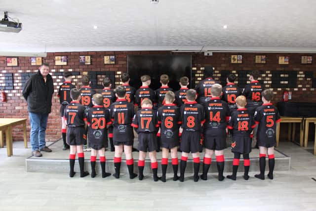 The under 12’s team at Upton Amateur Rugby League Club with their shirts sponsored by AN Abraham