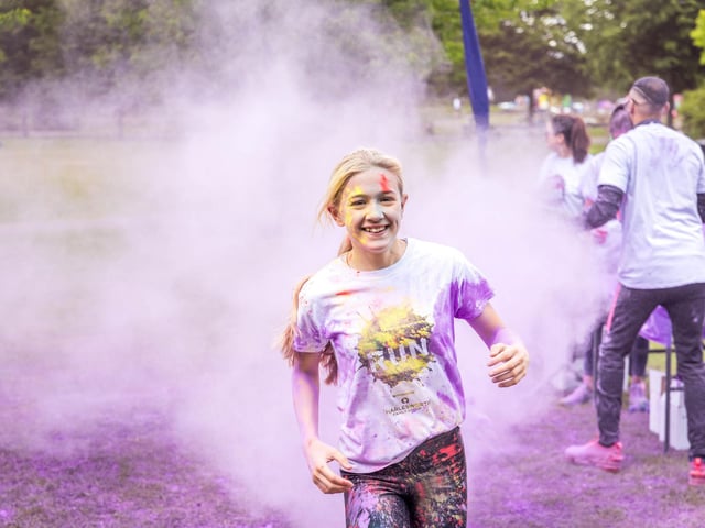 Running through purple at  Forget Me Not children's hospice Colour Run June 14th 2025 (photo credit Mike Robinson)