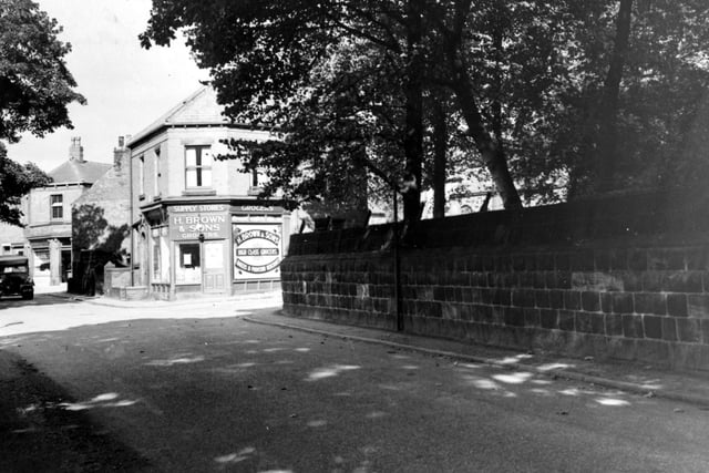 A view looking north west at the corner of Green Road and Church Lane in September 1951. H. Brown and Sons grocers can be seen. A truck is visible on the left.