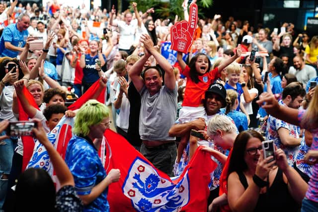 England fans celebrate following a screening of the FIFA Women's World Cup 2023 semi-final. Pubs and bars in Leeds will be permitted to open early on Sunday ahead of the final, when the Lionesses will face Spain (Photo by Victoria Jones/PA Wire)