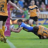 Chris Clarkson scores for Rhinos at Castleford in August, 2010. Picture by Mark Bickerdike.