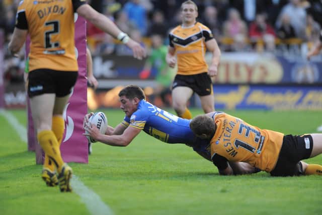 Chris Clarkson scores for Rhinos at Castleford in August, 2010. Picture by Mark Bickerdike.