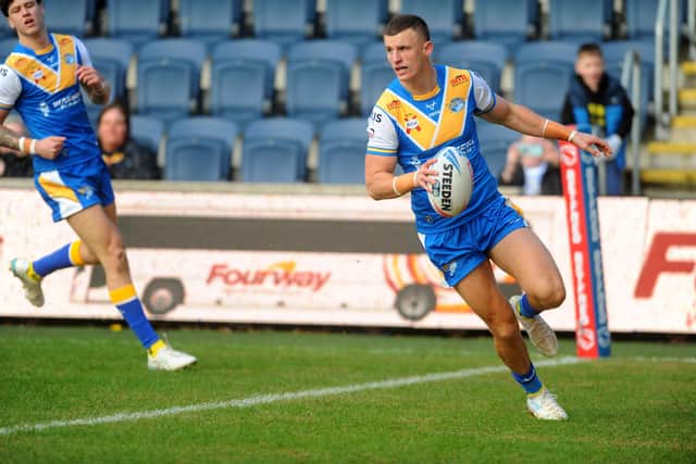 Leeds Rhinos captain Ash Handley scored two tries in the win against Bradford Bulls before suffering a groin injury. Picture by Steve Riding.