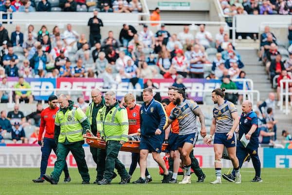 Jack Croft is stretchered off the field during Trinity's Magic Weekend defeat by Leigh. Picture by Alex Whitehead/SWpix.com.