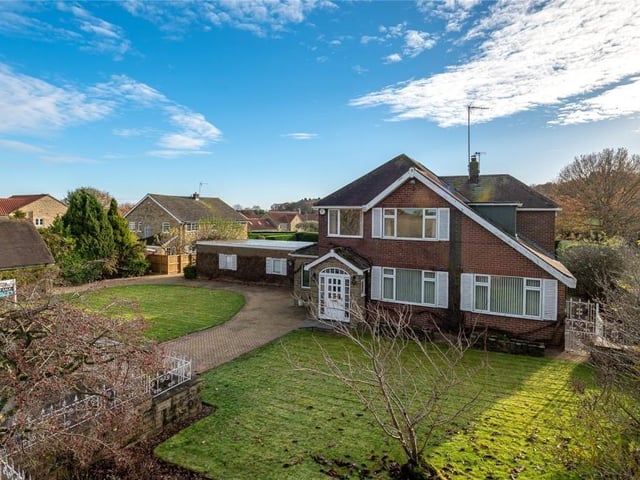 This three bedroom detached family home sits within approximately half an acre and adjoins to the open countryside. To the rear of the property is a stone flagged patio which leads on to a full sized tennis court and separate pool house, ideal for the sporting enthusiast.