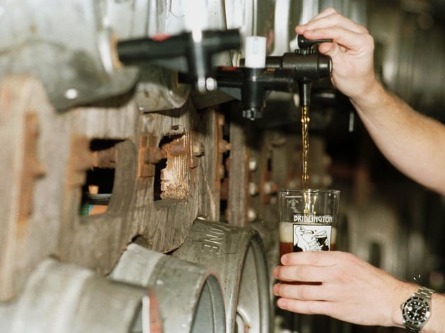 A pint of beer pulled from one of the 105 taps on barrels for drinkers to try during the beer festival at Bridlington Spa in October 1998.