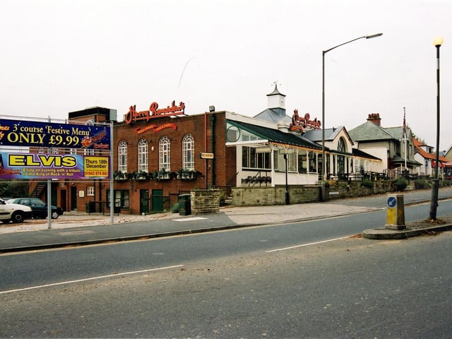 Harry Ramsden's fish and chip restaurant on Otley Road and the birth place of the world famous chain Huge advertising boards in October 2003 promote a Christmas party,  three course festive menu only £9.99 and an evening entitled Elvis - enjoy an evening with a tribute to the King of Rock 'n' Roll.