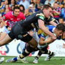 Thomas Minns, now of East Leeds, scores on his Leeds Rhinos debut against Castleford Tigers in 2013. Picture by Alex Whitehead/SWpix.com.