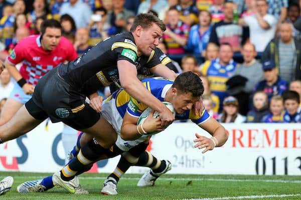 Thomas Minns, now of East Leeds, scores on his Leeds Rhinos debut against Castleford Tigers in 2013. Picture by Alex Whitehead/SWpix.com.