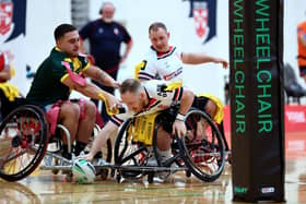 Leeds Rhinos' Nathan Collins scores for England in their wheelchair rugby league Test win against Australia at the Gold Coast Sports and Leisure Centre, in Carrara. Picture by Jason O'Brien/SWpix.com.