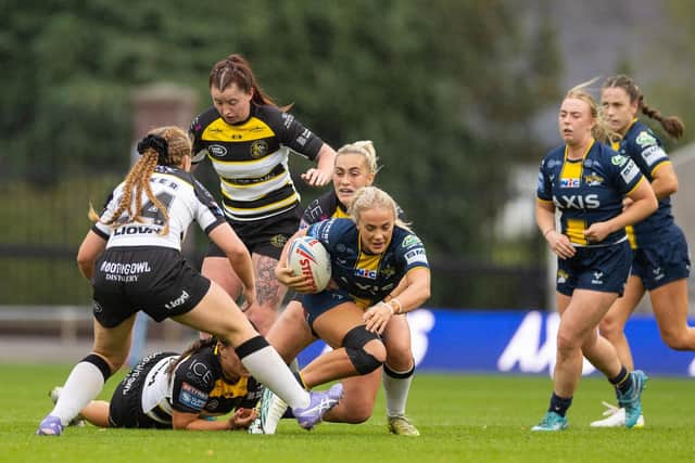 Lucy Murray of Leeds Rhinos is tackled during the Women's Super League semi-final defeat by York Valkyrie. Picture by Callum Pilkington/SWpix.com.
