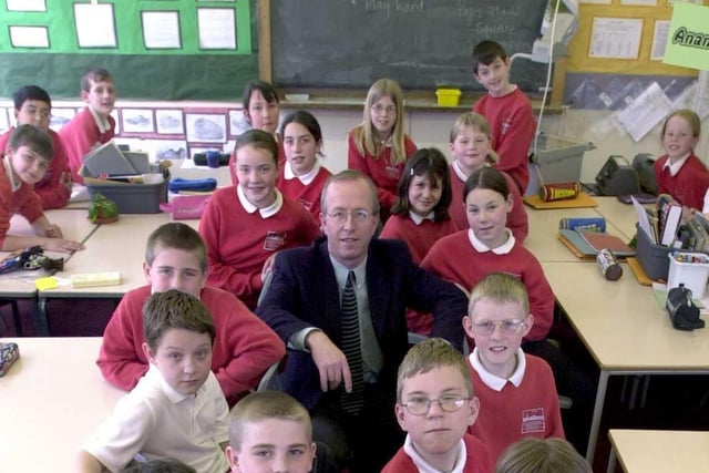 Cookrigde Primary School was celebrating a very good Ofsted report in April 2000. Pictured is head teacher Stuart Tomlinson with a group of Year 6 pupils.