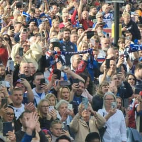 Thousands of Wakefield Trinity fans are lining the route of this afternoon's open top bus parade to celebrate the club's Super League Grand Final victory.
