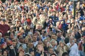 Thousands of Wakefield Trinity fans are lining the route of this afternoon's open top bus parade to celebrate the club's Super League Grand Final victory.