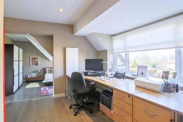 Accessed from steps up from the master bedroom and with door to the main landing, this space is currently used as a study/home office.