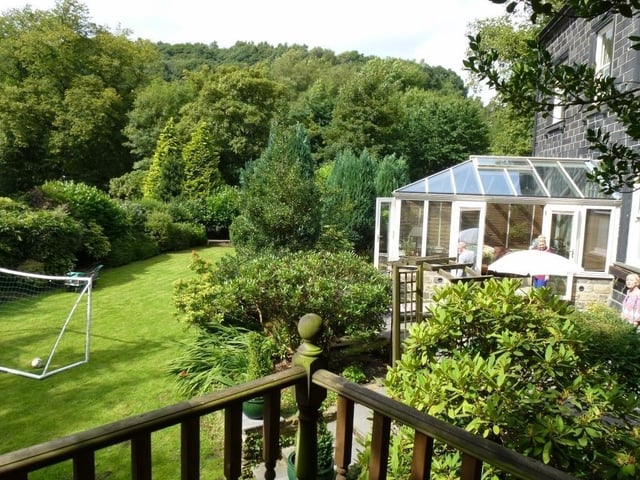 A conservatory has garden views, while the large lawn gives space for games or sports, or entertaining.