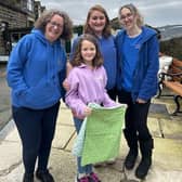 Autumn delivers the first batch of blankets to Emma, Sarah and Alyssa from Yorkshire Cat Rescue.