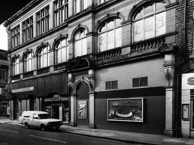 The former Morley Industrial Co-operative Society Ltd. building on Albion Street by the junction with Queen Street, left, in March 1982. It was occupied by Barclays Bank and Candyman tobacconists and confectioners. Just visible on the right is the edge of Servo Discount Centre. Part of Morley Town Hall can be seen on Queen Street on the left.