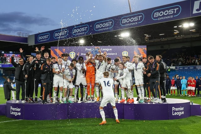 Leeds United Under-21s' players and staff celebrate their promotion at Elland Road (Pic: Leeds United)