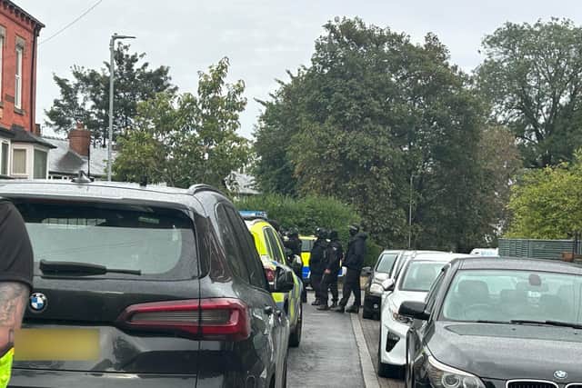 Armed police swooped on Reginald Mount, Chapeltown, Leeds, on September 12, arresting three men on suspicion of possession of a Class B drug with intent to supply, while a police helicopter circled above.