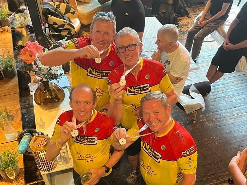 Richard Vause, 62, Donald Priestley, 68, Stuart Eakin, 63, and Brian Elsegood, 56 - all from the Birkenshaw - all took part. Here they are showing off their medals.