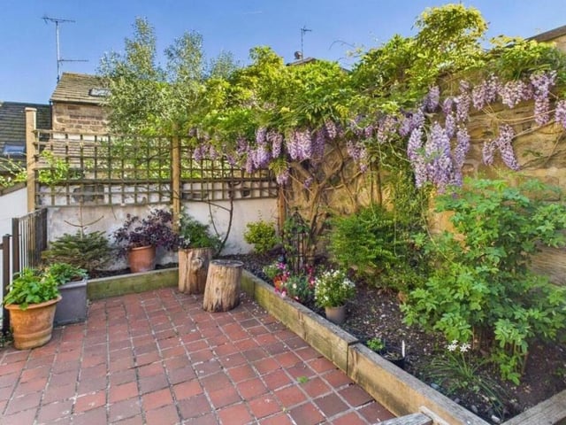 A section of the cottage's tiered courtyard garden.