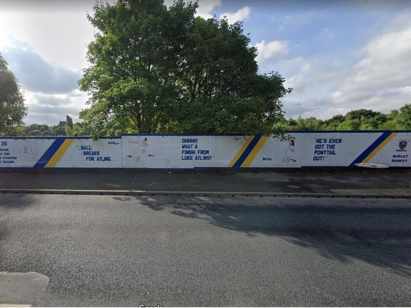 Created by Burley Banksy, the mural honours current right back Luke Ayling and looks back at the final Leeds United match held before the national Covid-19 lockdown was impsoed in 2020.